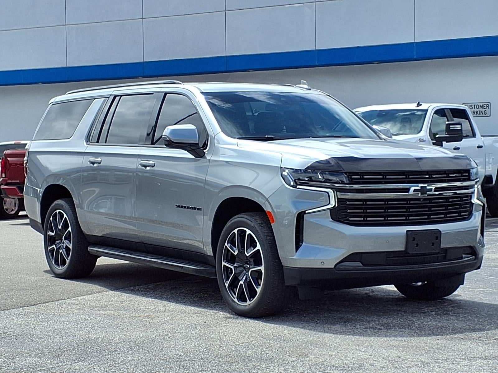 2024 Chevrolet Suburban RST in Sterling Gray Metallic — front three-quarter view